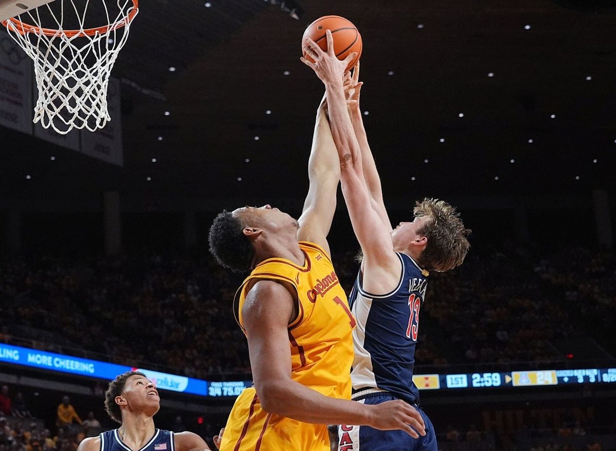 Iowa State Cyclones center Dishon Jackson (1) and Arizona Wildcats forward Henri Veesaar (13) battle for a rebound during the first half in the Big-12 men’s basketball showdown at Hilton Coliseum on Saturday March 1, 2025 in Ames, Iowa.