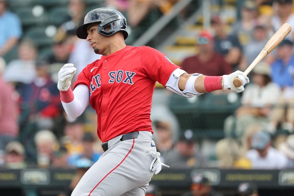 Mar 4, 2025; Bradenton, Florida, USA;  Boston Red Sox second base Vaughn Grissom (5) singles during the fourth inning against the Pittsburgh Pirates at LECOM Park. Mandatory Credit: Kim Klement Neitzel-Imagn Images