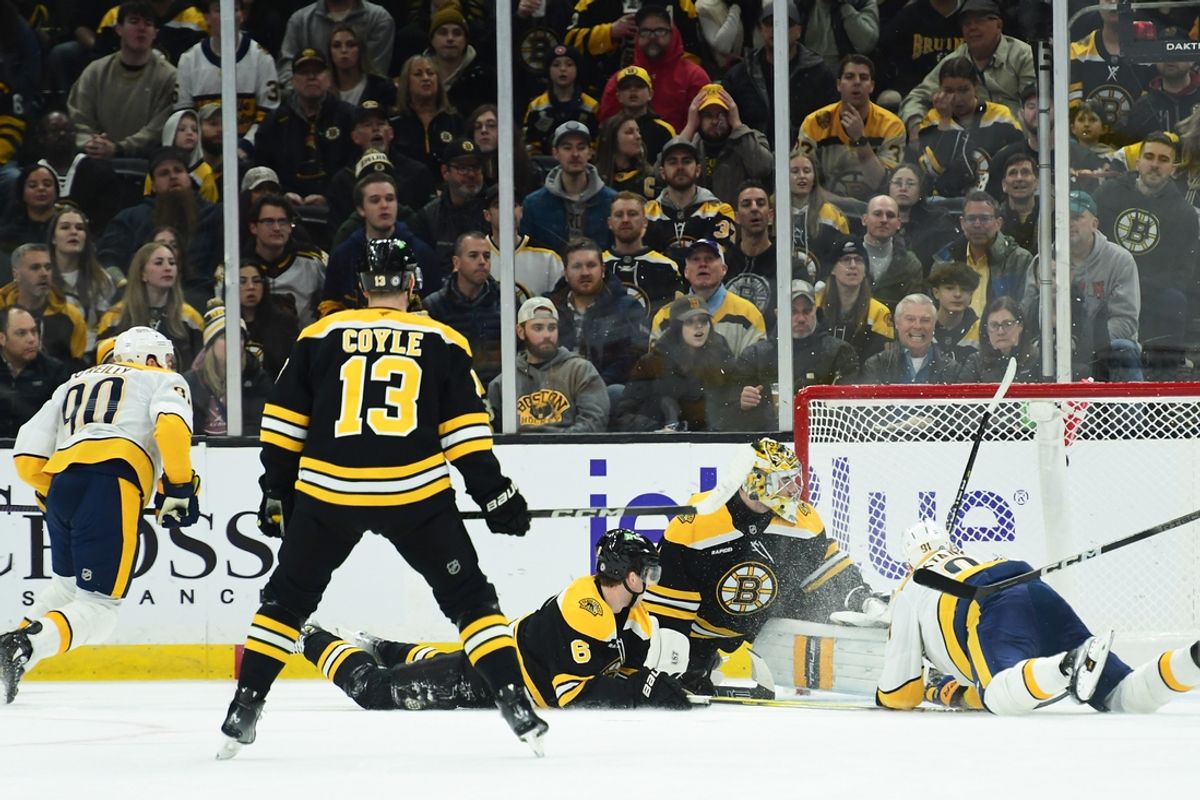 Mar 4, 2025; Boston, Massachusetts, USA; Nashville Predators center Ryan O'Reilly (90) scores a goal past Boston Bruins goaltender Jeremy Swayman (1) during the first period at TD Garden. Mandatory Credit: Bob DeChiara-Imagn Images