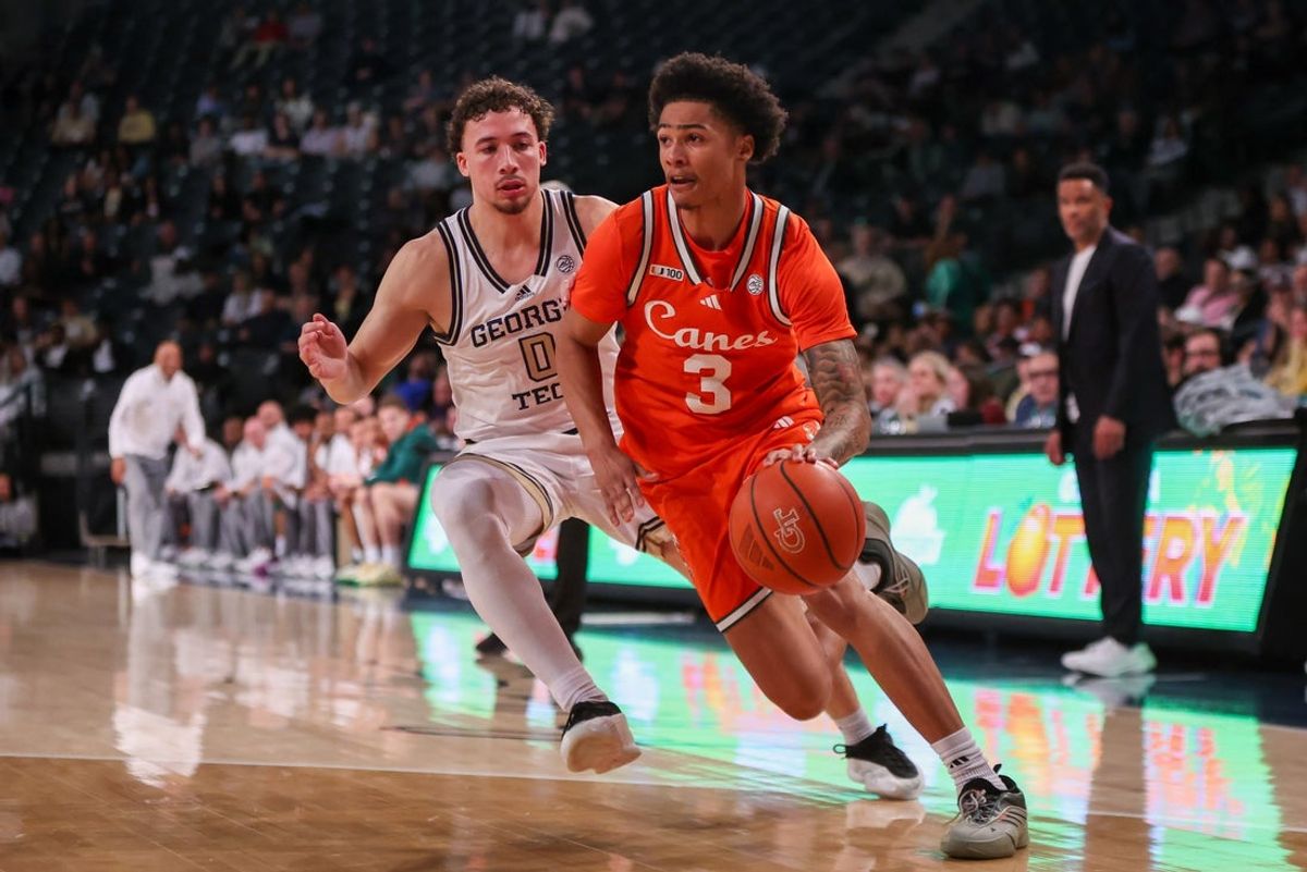 Mar 4, 2025; Atlanta, Georgia, USA; Miami Hurricanes guard Jalil Bethea (3) drives past Georgia Tech Yellow Jackets guard Lance Terry (0) in the first half at McCamish Pavilion. Mandatory Credit: Brett Davis-Imagn Images