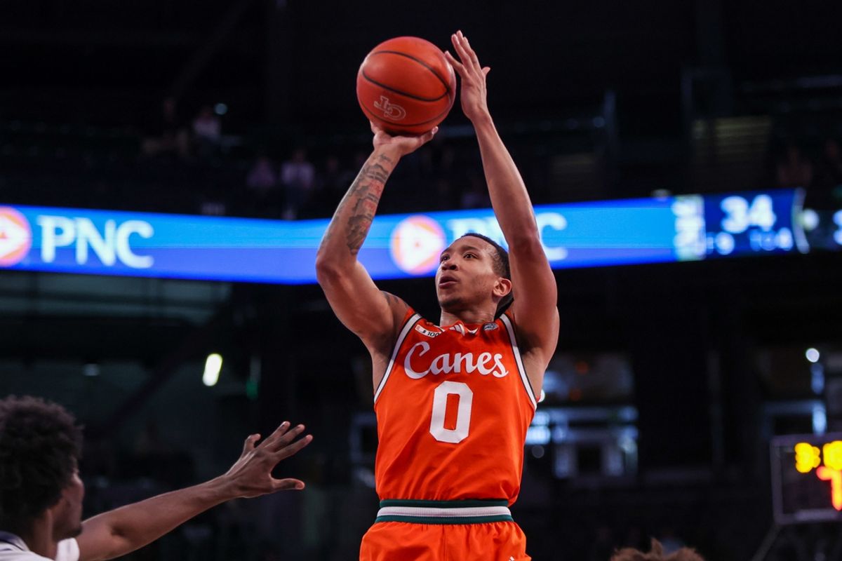 Mar 4, 2025; Atlanta, Georgia, USA; Miami Hurricanes guard Matthew Cleveland (0) shoots against the Georgia Tech Yellow Jackets in the first half at McCamish Pavilion. Mandatory Credit: Brett Davis-Imagn Images