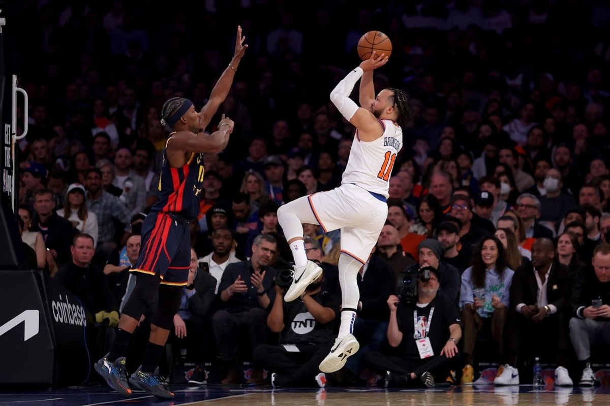 Mar 4, 2025; New York, New York, USA; New York Knicks guard Jalen Brunson (11) takes a shot against Golden State Warriors forward Jimmy Butler III (10) during the second quarter at Madison Square Garden. Mandatory Credit: Brad Penner-Imagn Images