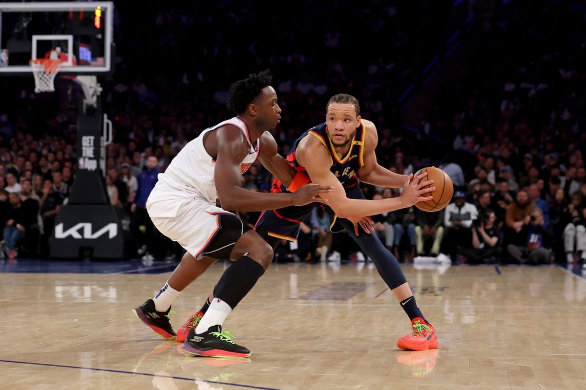Mar 4, 2025; New York, New York, USA; Golden State Warriors forward Kevin Knox II (31) controls the ball against New York Knicks forward OG Anunoby (8) during the second quarter at Madison Square Garden. Mandatory Credit: Brad Penner-Imagn Images