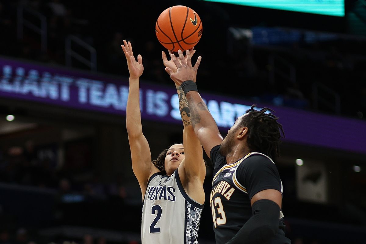Mar 4, 2025; Washington, District of Columbia, USA; Georgetown Hoyas guard Malik Mack (2) takes a shot over Villanova Wildcats forward Eric Dixon (43) during the first half at Capital One Arena. Mandatory Credit: Daniel Kucin Jr.-Imagn Images