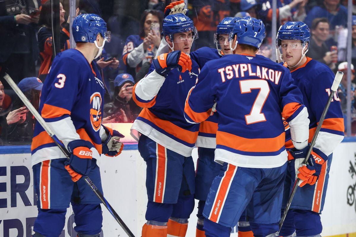 Mar 4, 2025; Elmont, New York, USA;  New York Islanders center Brock Nelson (29) celebrates with his teammates after scoring a goal in the second period against the Winnipeg Jets at UBS Arena. Mandatory Credit: Wendell Cruz-Imagn Images