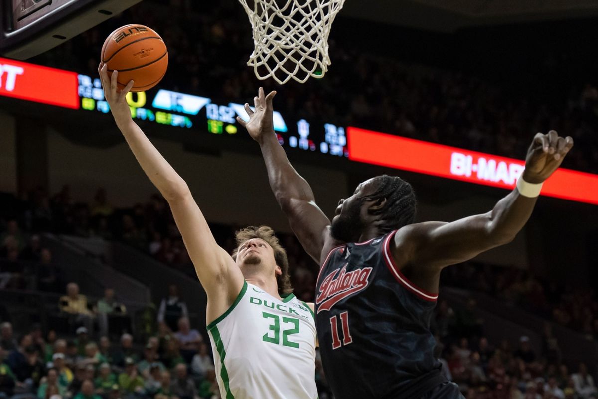 Oregon center Nate Bittle rebounds the ball over Indiana center Oumar Ballo as the Oregon Ducks host the Indiana Hoosiers Tuesday, March 4, 2025, at Matthew Knight Arena in Eugene, Ore.