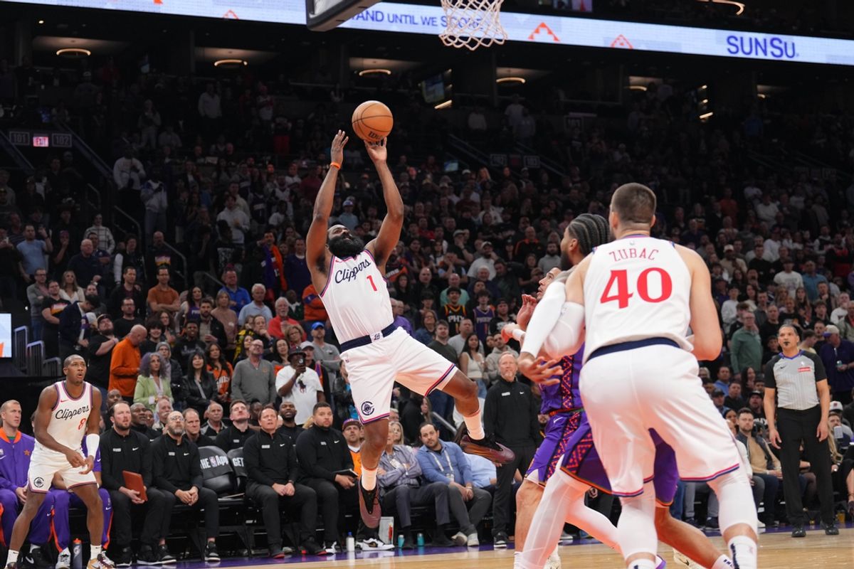 Mar 4, 2025; Phoenix, Arizona, USA; LA Clippers guard James Harden (1) shoots against the Phoenix Suns during the first half at PHX Center. Mandatory Credit: Joe Camporeale-Imagn Images