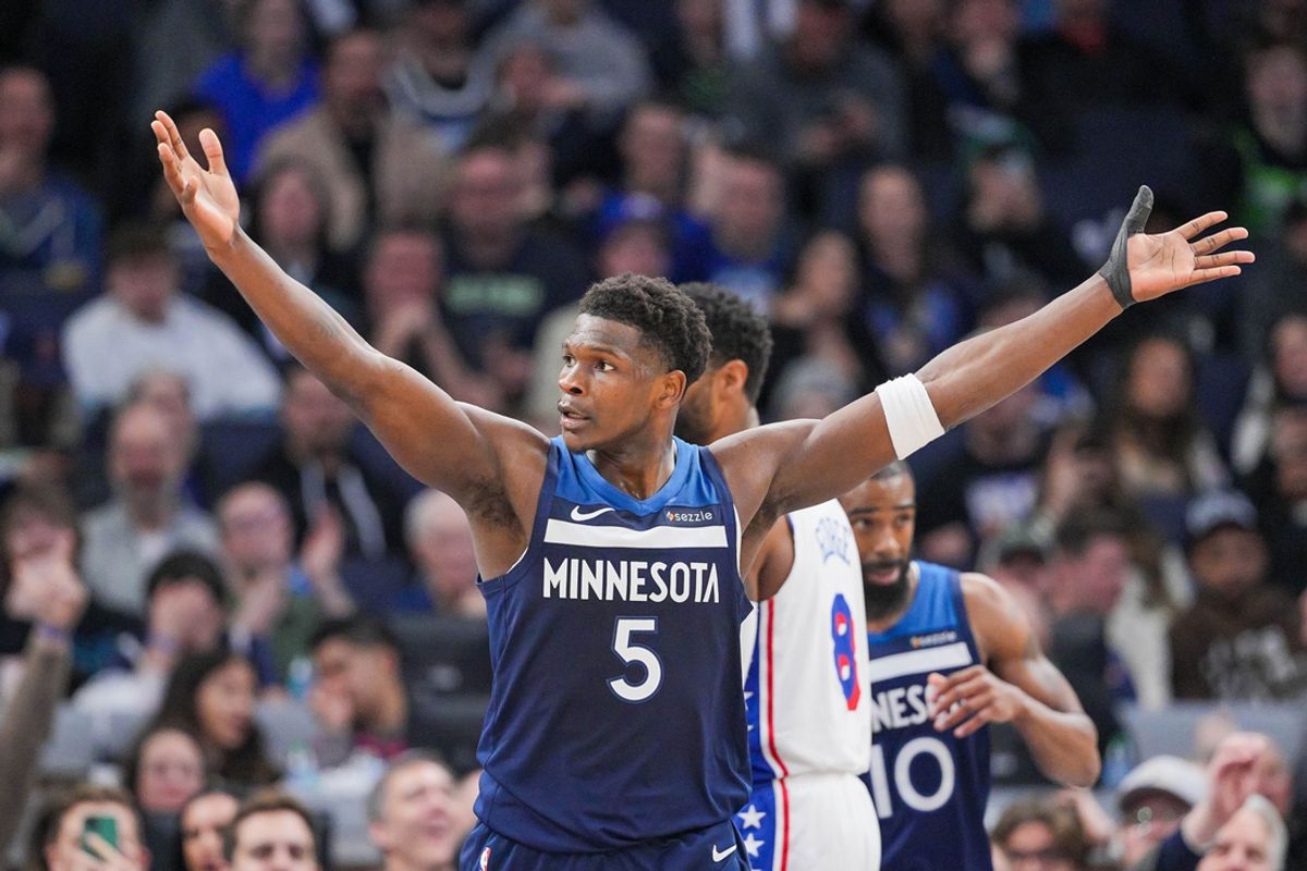 Mar 4, 2025; Minneapolis, Minnesota, USA; Minnesota Timberwolves guard Anthony Edwards (5) reacts to a call against the Philadelphia 76ers in the third quarter at Target Center. Mandatory Credit: Brad Rempel-Imagn Images