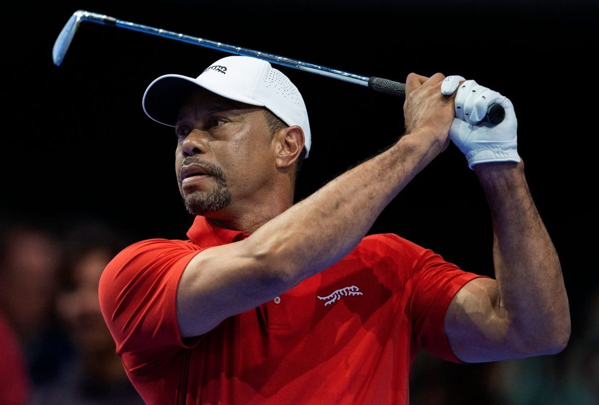 Tiger Woods of Jupiter Links GC tees off during a TGL match Atlanta Drive GC at SoFi Center on March 4, 2025, in Palm Beach Gardens, Florida.