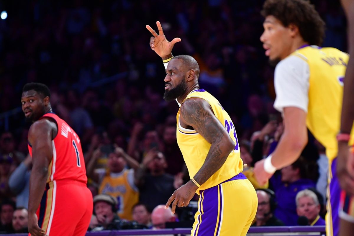 Mar 4, 2025; Los Angeles, California, USA;  Los Angeles Lakers forward LeBron James (23) reacts after scoring a three point basket and recording 50,000 career NBA points against the against the New Orleans Pelicans during the first half at Crypto.com Arena. Mandatory Credit: Gary A. Vasquez-Imagn Images