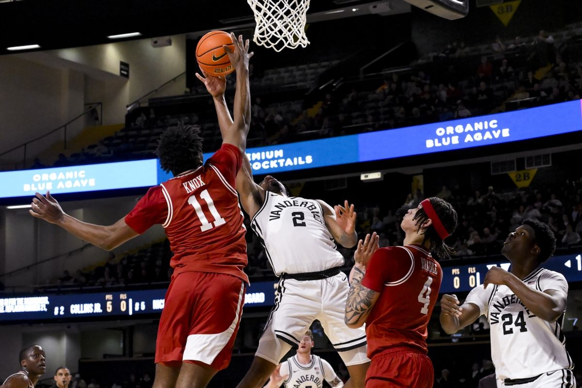 Mar 4, 2025; Nashville, Tennessee, USA;  Arkansas Razorbacks forward Karter Knox (11) blocks the shot of  Vanderbilt Commodores guard MJ Collins Jr. (2) during the first half at Memorial Gymnasium. Mandatory Credit: Steve Roberts-Imagn Images