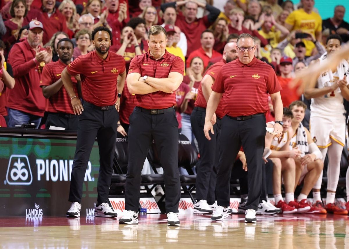 Mar 4, 2025; Ames, Iowa, USA;  Iowa State Cyclones head coach T.J. Otzelberger, JR Blount and Kyle Green watch the Cyclones play the Brigham Young Cougars during the second half at James H. Hilton Coliseum. Mandatory Credit: Reese Strickland-Imagn Images