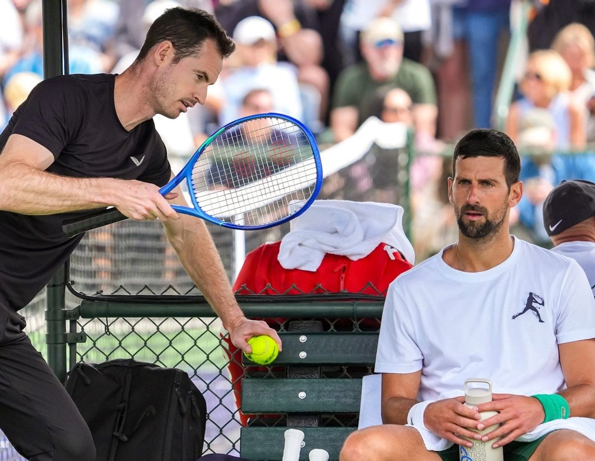 Andy Murray (left) chats with Novak Djokovic as he takes a break from his practice session at the Indian Wells Tennis Garden in Indian Wells, Calif., Wednesday, March 5, 2025.
