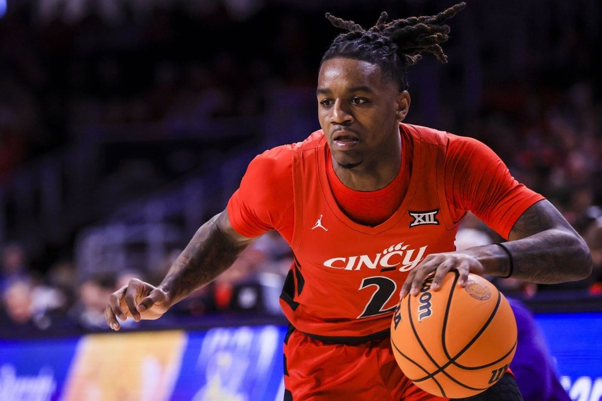 Mar 5, 2025; Cincinnati, Ohio, USA; Cincinnati Bearcats guard Jizzle James (2) dribbles against the Kansas State Wildcats in the first half at Fifth Third Arena. Mandatory Credit: Katie Stratman-Imagn Images