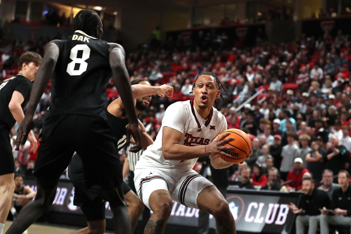 Mar 5, 2025; Lubbock, Texas, USA; Texas Tech Red Raiders forward Darrion Williams (5) controls the ball against Colorado Buffaloes guard Javon Ruffin (11) in the first half at United Supermarkets Arena. Mandatory Credit: Michael C. Johnson-Imagn Images