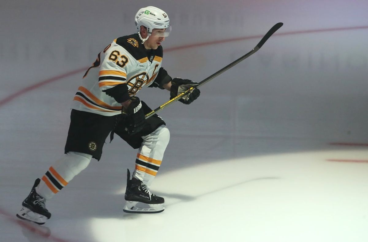Mar 1, 2025; Pittsburgh, Pennsylvania, USA;  Boston Bruins left wing Brad Marchand (63) takes the ice to warm up against the Pittsburgh Penguins at PPG Paints Arena. Mandatory Credit: Charles LeClaire-Imagn Images