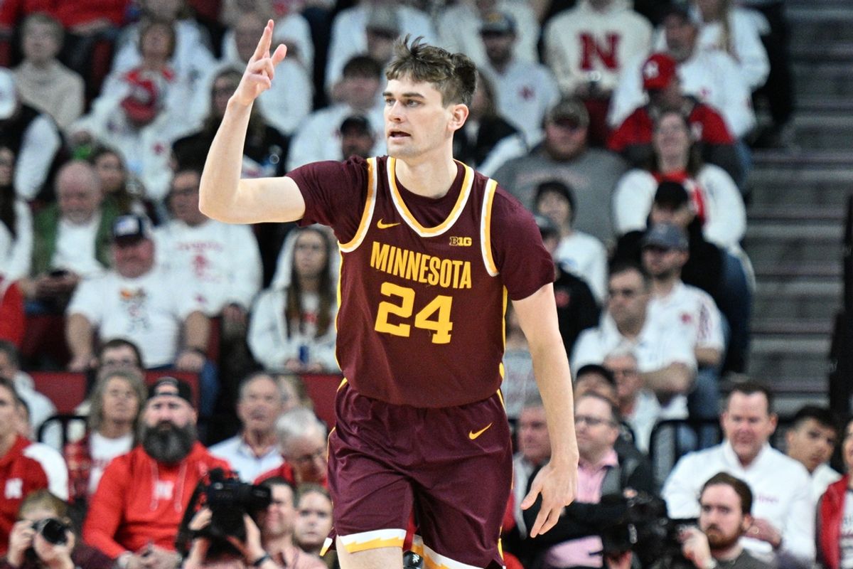 Mar 1, 2025; Lincoln, Nebraska, USA;  Minnesota Golden Gophers guard Brennan Rigsby (24) signals after making a three point shot against the Nebraska Cornhuskers during the first half at Pinnacle Bank Arena. Mandatory Credit: Steven Branscombe-Imagn Images