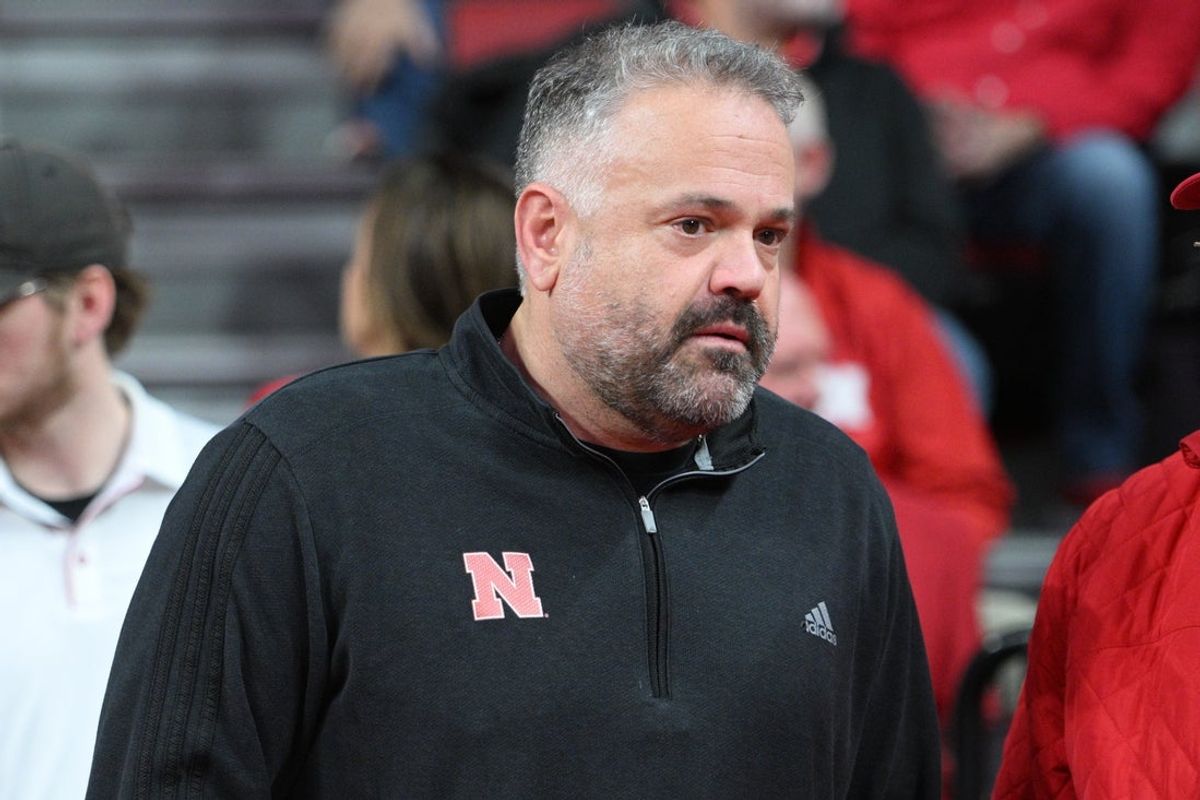 Mar 1, 2025; Lincoln, Nebraska, USA;  Nebraska Cornhuskers football coach Matt Rhule watches the game between the Nebraska Cornhuskers and the Minnesota Golden Gophers during the first half at Pinnacle Bank Arena. Mandatory Credit: Steven Branscombe-Imagn Images