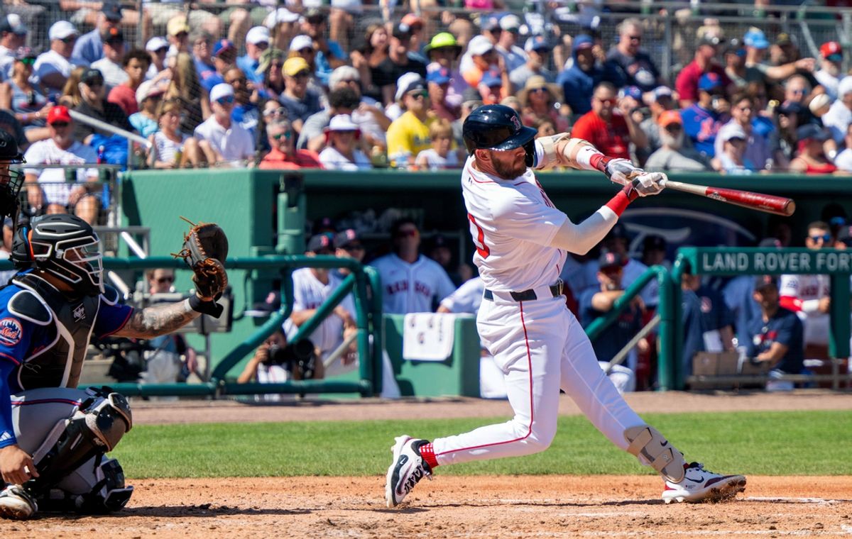 Mar 2, 2025; Fort Myers, Florida, USA; Boston Red Sox Trevor Story (10) doubles in the third inning on a fly ball to left field at JetBlue Park at Fenway South against the New York Mets. Mandatory Credit: Chris Tilley-Imagn Images