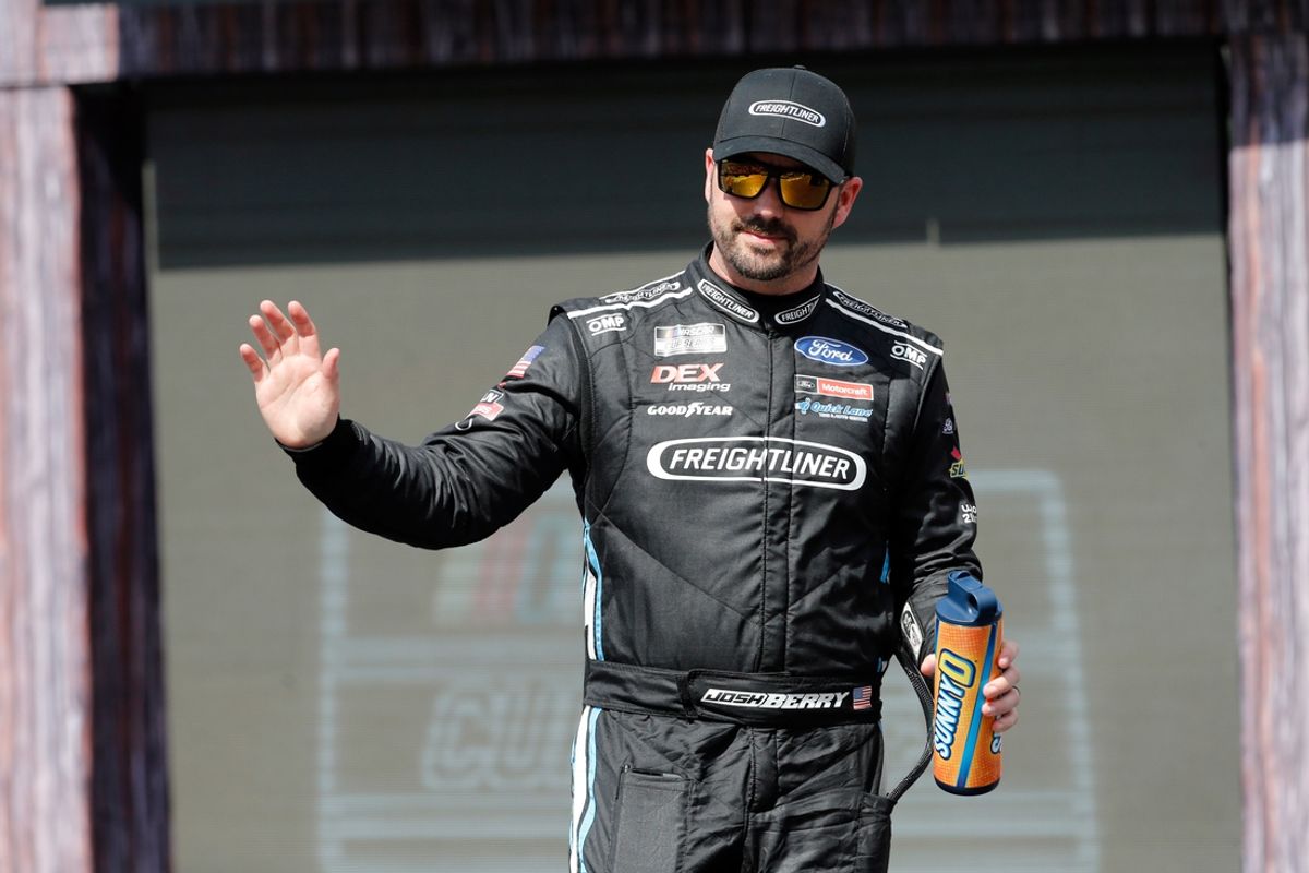 Mar 2, 2025; Austin, Texas, USA; NASCAR Cup Series driver Josh Berry (21) walks out onto the stage for driver introductions before the EchoPark Automotive Grand Prix at Circuit of the Americas. Mandatory Credit: Jamie Harms-Imagn Images