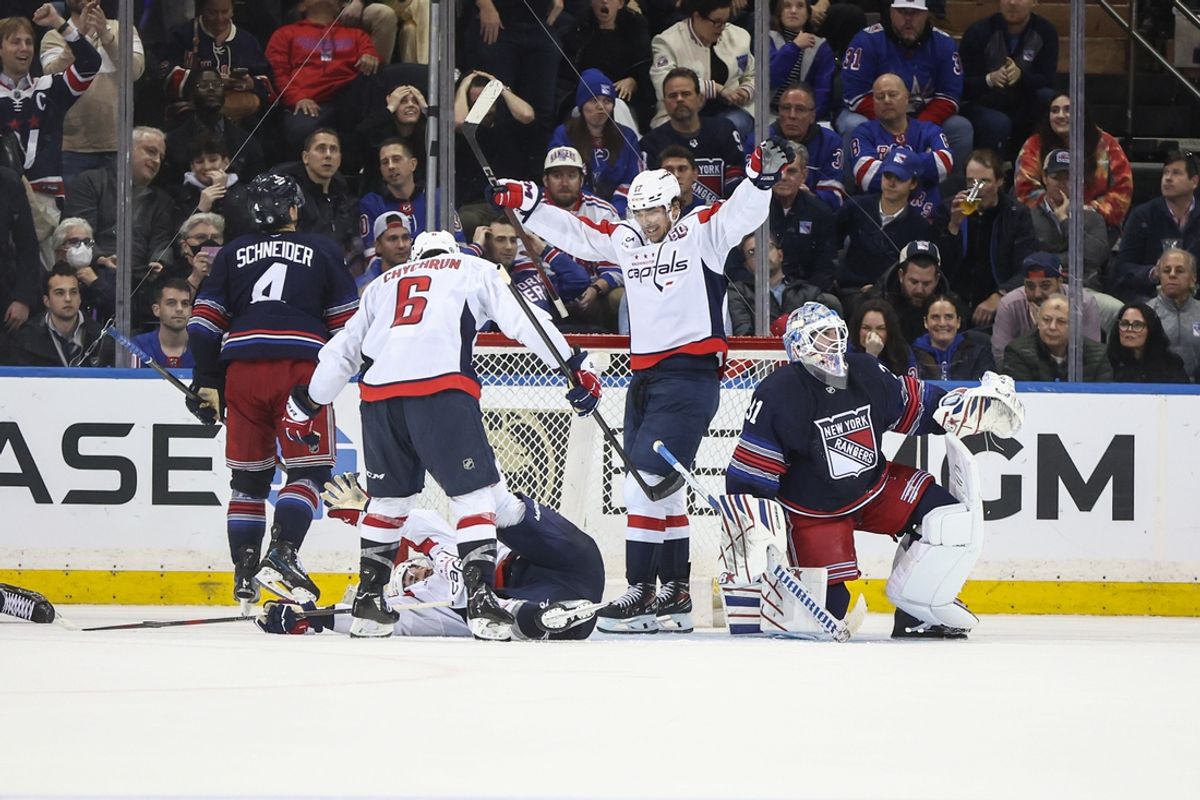 Mar 5, 2025; New York, New York, USA;  The Washington Capitals celebrate after right wing Tom Wilson (43) scores a goal to defeat the New York Rangers in overtime at Madison Square Garden. Mandatory Credit: Wendell Cruz-Imagn Images