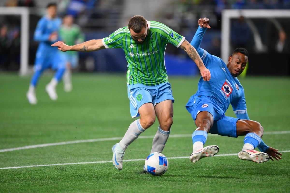 Mar 5, 2025; Seattle, Washington, USA; Seattle Sounders FC forward Jordan Morris (13) plays the ball while defended by Cruz Azul defender Willer Ditta (4) during the first half at Lumen Field. Mandatory Credit: Steven Bisig-Imagn Images