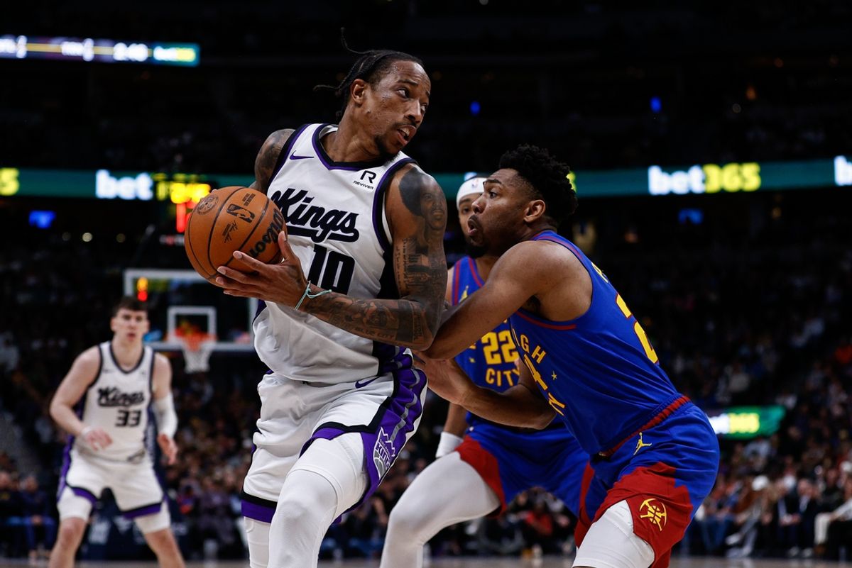 Mar 5, 2025; Denver, Colorado, USA; Sacramento Kings forward DeMar DeRozan (10) controls the ball under pressure from Denver Nuggets guard Jalen Pickett (24) in the third quarter at Ball Arena. Mandatory Credit: Isaiah J. Downing-Imagn Images