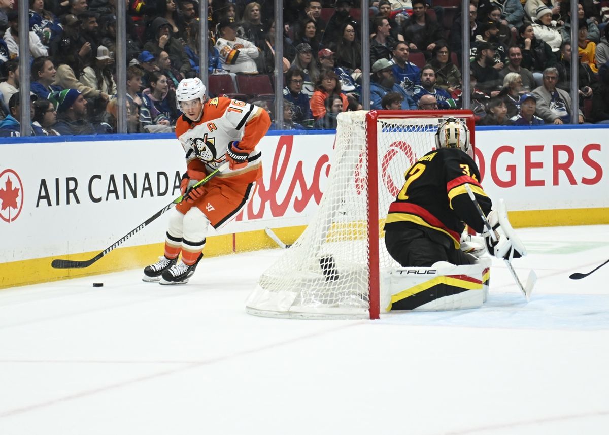 Mar 5, 2025; Vancouver, British Columbia, CAN; Anaheim Ducks forward Ryan Strome (16) skates with puck behind Vancouver Canucks goaltender Kevin Lanikinen (32) during the second period at Rogers Arena. Mandatory Credit: Simon Fearn-Imagn Images
