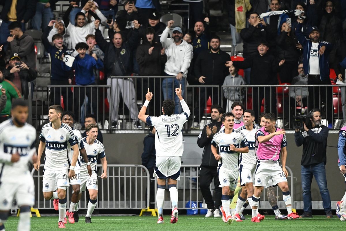 Mar 5, 2025; Vancouver, British Columbia, CAN;  Vancouver Whitecaps FC defender Belal Halbouni (12) celebrates scoring during the second half against CF Monterrey at BC Place. Mandatory Credit: Anne-Marie Sorvin-Imagn Images