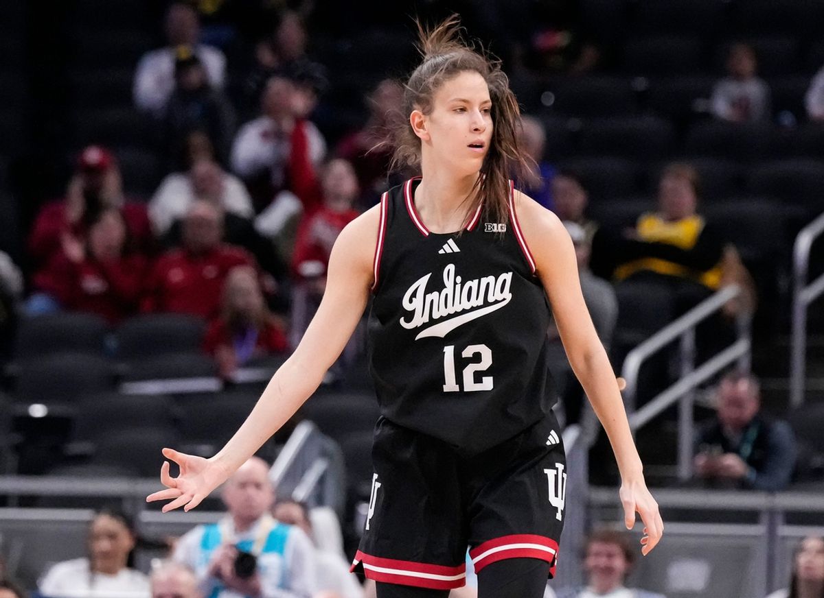 Indiana Hoosiers guard Yarden Garzon (12) celebrates scoring a three point basket Thursday, March 6, 2025, during the Big Ten women's tournament at Gainbridge Fieldhouse in Indianapolis. Indiana Hoosiers defeated the Oregon Ducks, 78-62.