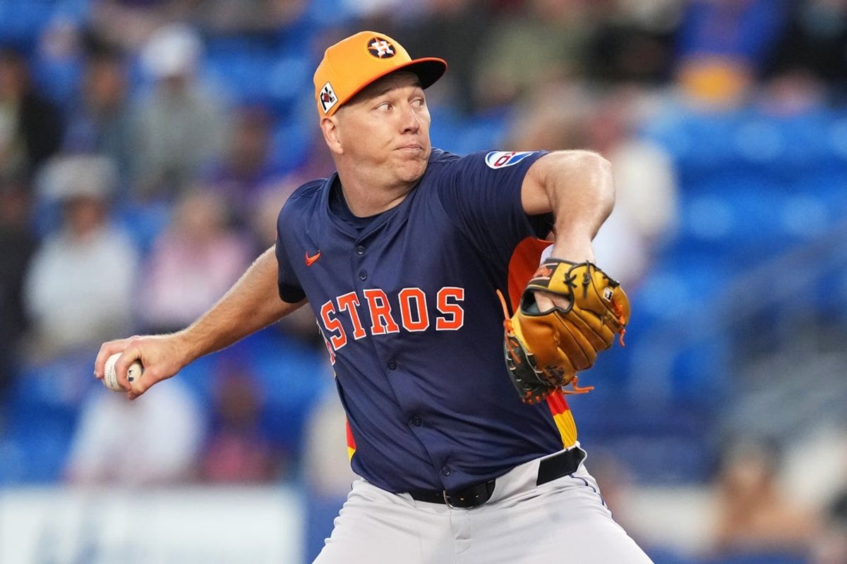 Mar 6, 2025; Port St. Lucie, Florida, USA;  Houston Astros pitcher Ryan Gusto (67) pitches against the against the New York Mets in the first inning at Clover Park. Mandatory Credit: Jim Rassol-Imagn Images