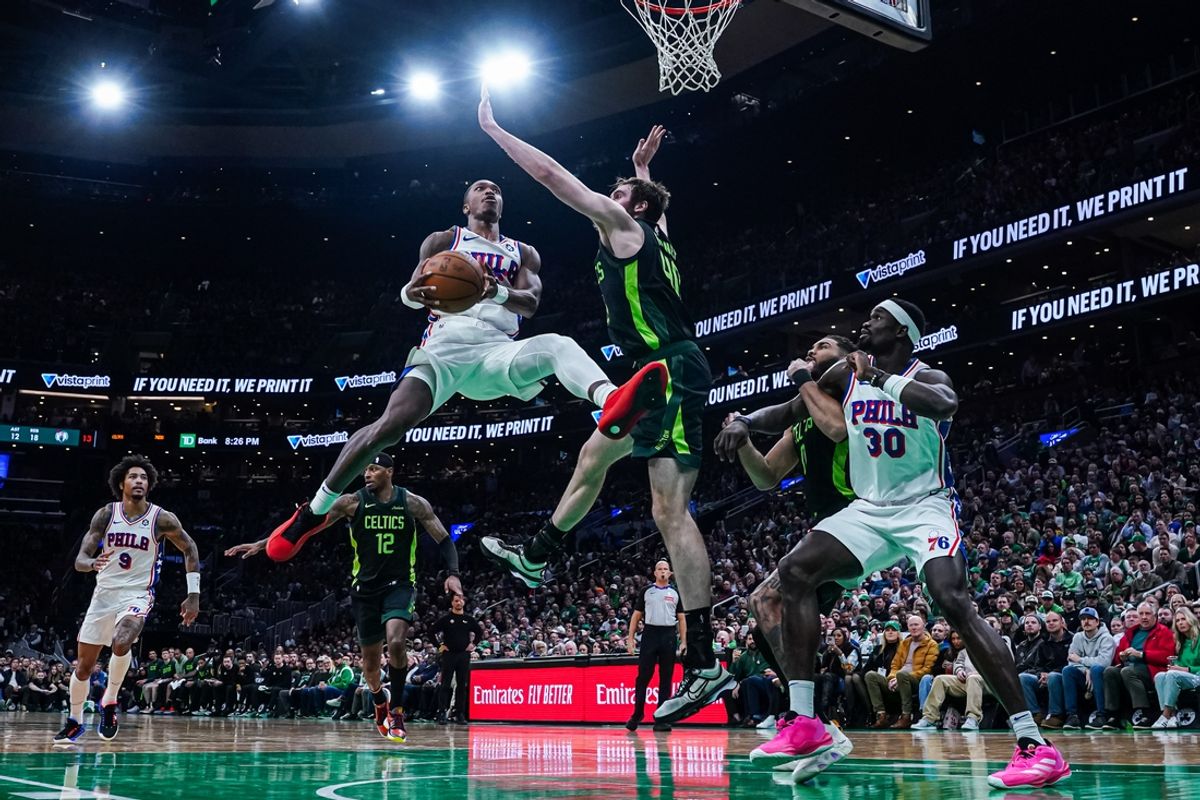Mar 6, 2025; Boston, Massachusetts, USA; Philadelphia 76ers guard Lonnie Walker IV (16) shoots the ball against Boston Celtics center Luke Kornet (40) in the second quarter at TD Garden. Mandatory Credit: David Butler II-Imagn Images