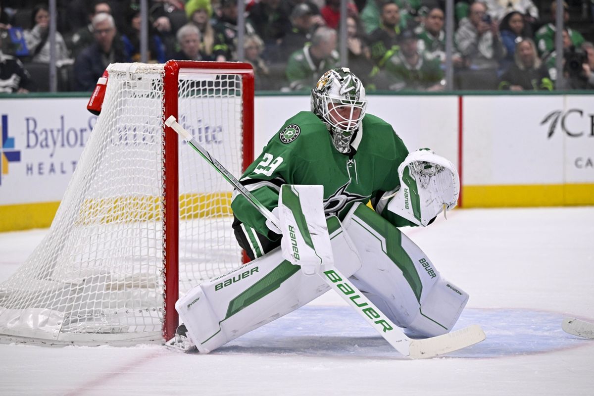 Mar 6, 2025; Dallas, Texas, USA; Dallas Stars goaltender Jake Oettinger (29) faces the Calgary Flames attack during the first period at the American Airlines Center. Mandatory Credit: Jerome Miron-Imagn Images