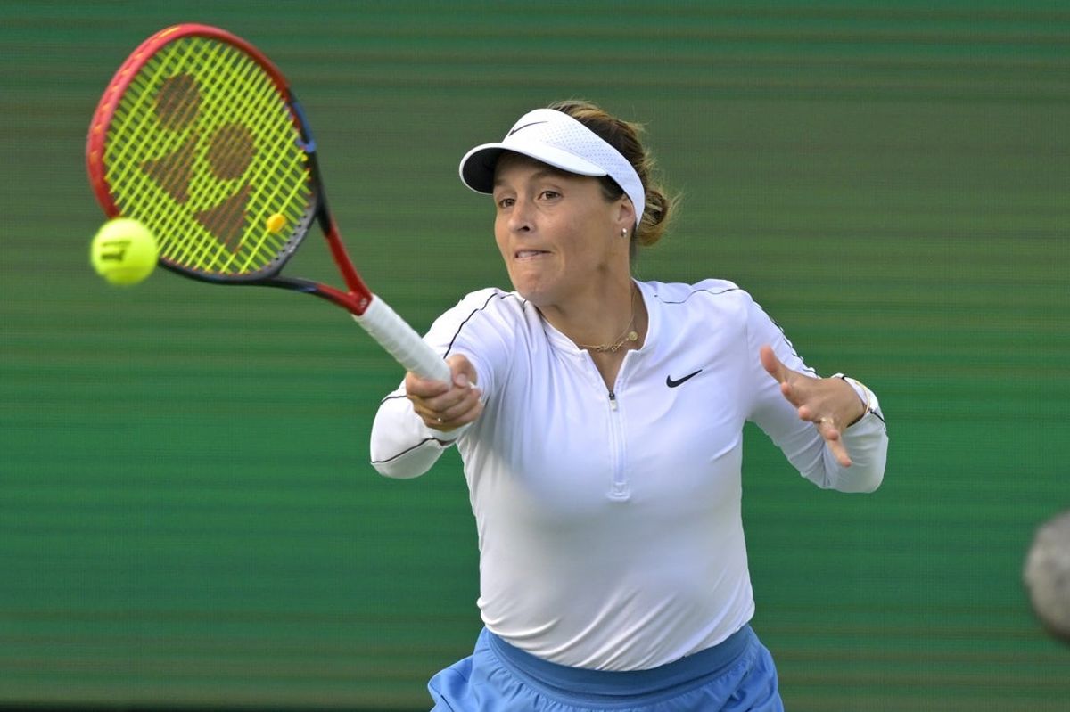 Mar 6, 2025; Indian Wells, CA, USA;  Tatjana Maria (GER) hits a shot during her first round match against Belinda Bencic (not pictured) in the BNP Paribas Open at the Indian Well Tennis Garden. Mandatory Credit: Jayne Kamin-Oncea-Imagn Images