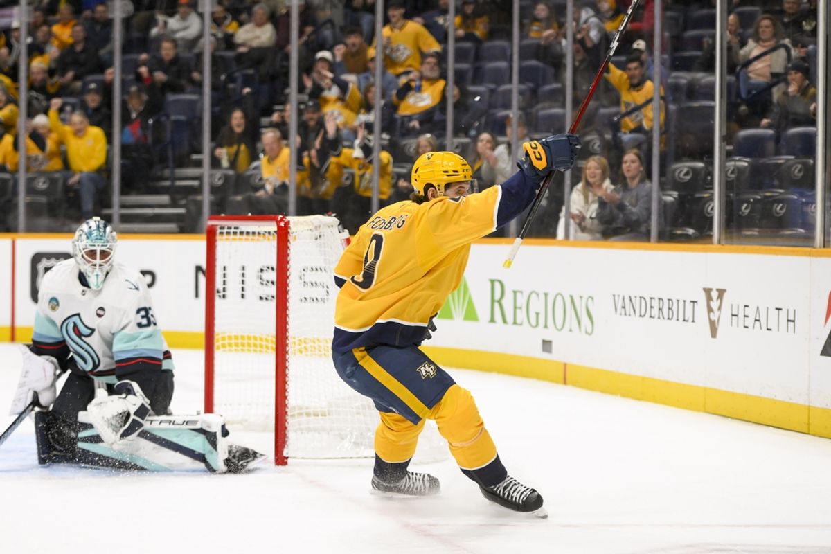 Mar 6, 2025; Nashville, Tennessee, USA;  Nashville Predators left wing Filip Forsberg (9) celebrates his goal against the Seattle Krakenduring the first period at Bridgestone Arena. Mandatory Credit: Steve Roberts-Imagn Images