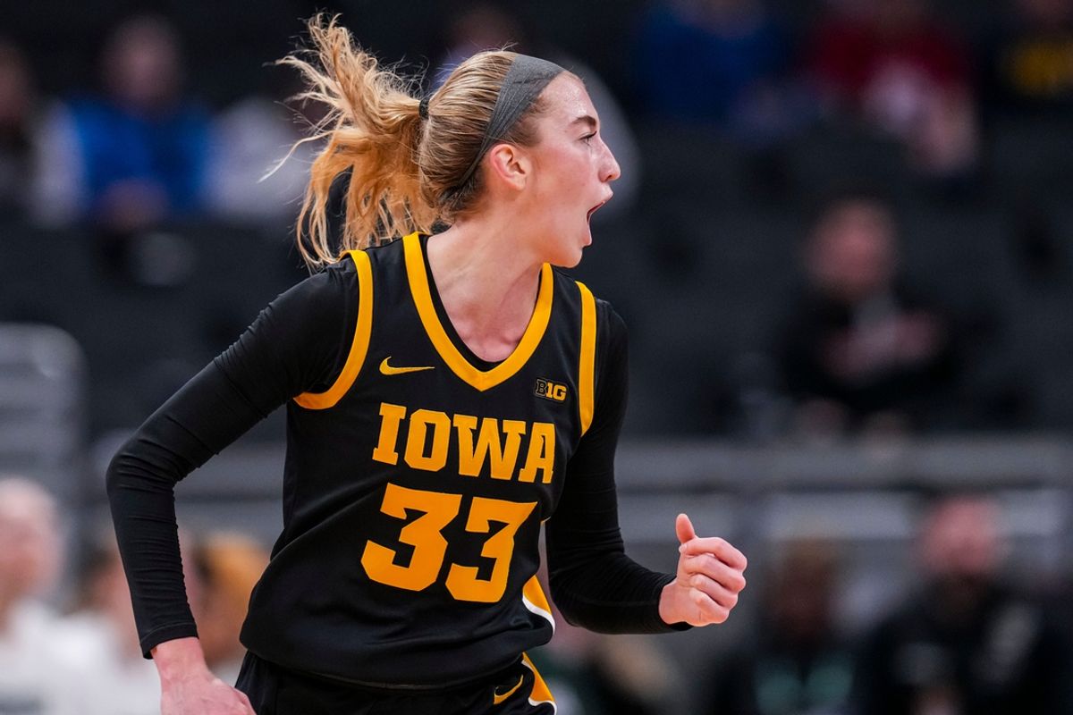Iowa Hawkeyes guard Lucy Olsen (33) celebrates after scoring Thursday, March 6, 2025, in a round two game at the 2025 TIAA Big Ten Women's Basketball Tournament between the Iowa Hawkeyes and the Michigan State Spartans at Gainbridge Fieldhouse in Indianapolis.