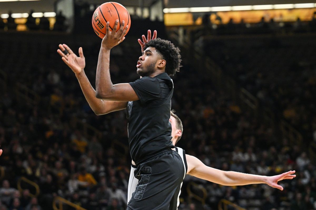 Michigan State Spartans guard Jase Richardson (11) goes to the basket against the Iowa Hawkeyes during the first half at Carver-Hawkeye Arena.