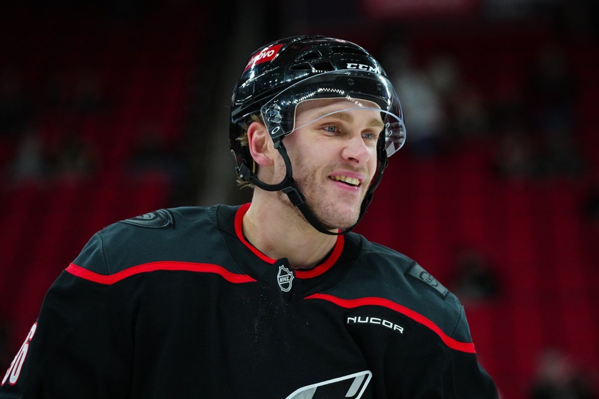 Mar 6, 2025; Raleigh, North Carolina, USA;  Carolina Hurricanes right wing Mikko Rantanen (96) looks on during the warmups before the game against the Boston Bruins at Lenovo Center. Mandatory Credit: James Guillory-Imagn Images