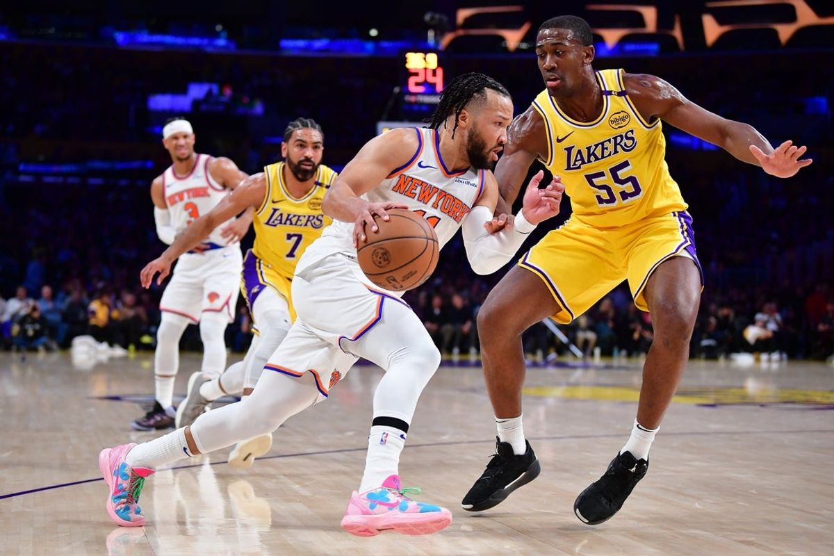 Mar 6, 2025; Los Angeles, California, USA; New York Knicks guard Jalen Brunson (11) moves to the basket against Los Angeles Lakers center Trey Jemison III (55) during the first half at Crypto.com Arena. Mandatory Credit: Gary A. Vasquez-Imagn Images