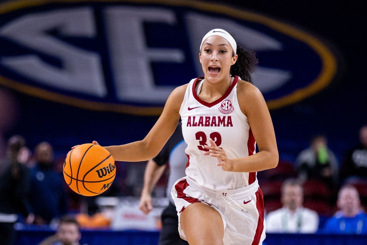 Mar 6, 2025; Greenville, SC, USA; Alabama Crimson Tide guard Aaliyah Nye (32) brings the ball up court during the second half against the Florida Gators at Bon Secours Wellness Arena. Mandatory Credit: Scott Kinser-Imagn Images