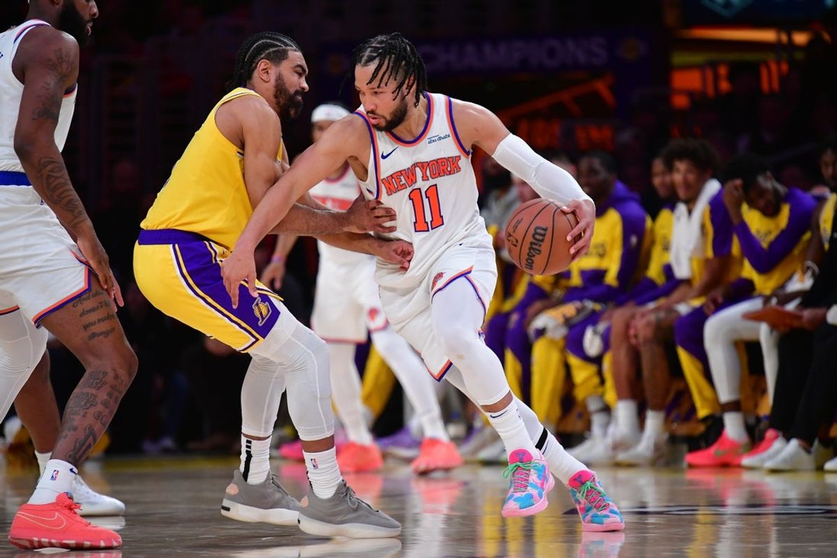 Mar 6, 2025; Los Angeles, California, USA; New York Knicks guard Jalen Brunson (11) moves the ball against Los Angeles Lakers guard Gabe Vincent (7) during the second half at Crypto.com Arena. Mandatory Credit: Gary A. Vasquez-Imagn Images
