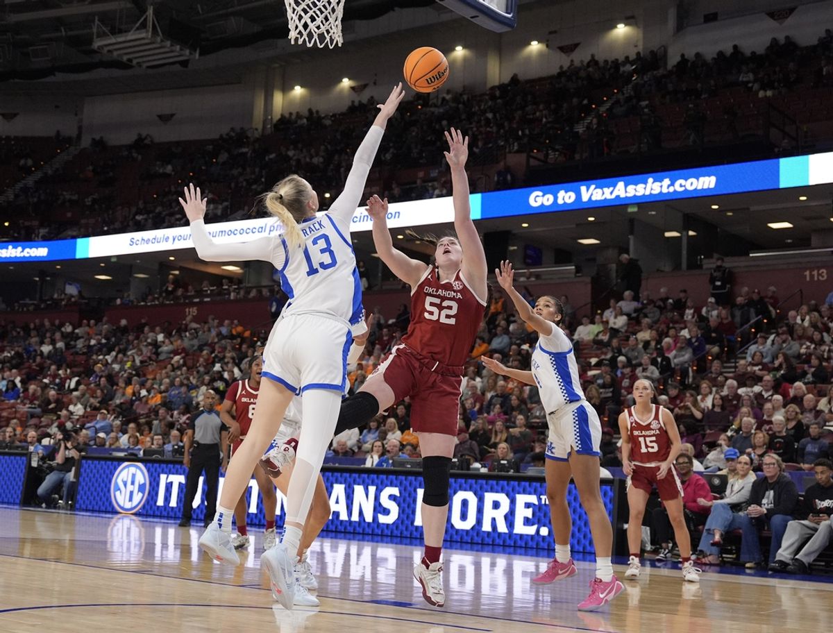 Mar 7, 2025; Greenville, SC, USA; Kentucky Wildcats center Clara Strack (13) tries for the block on the shot by Oklahoma Sooners center Raegan Beers (52) during the first half at Bon Secours Wellness Arena. Mandatory Credit: Jim Dedmon-Imagn Images