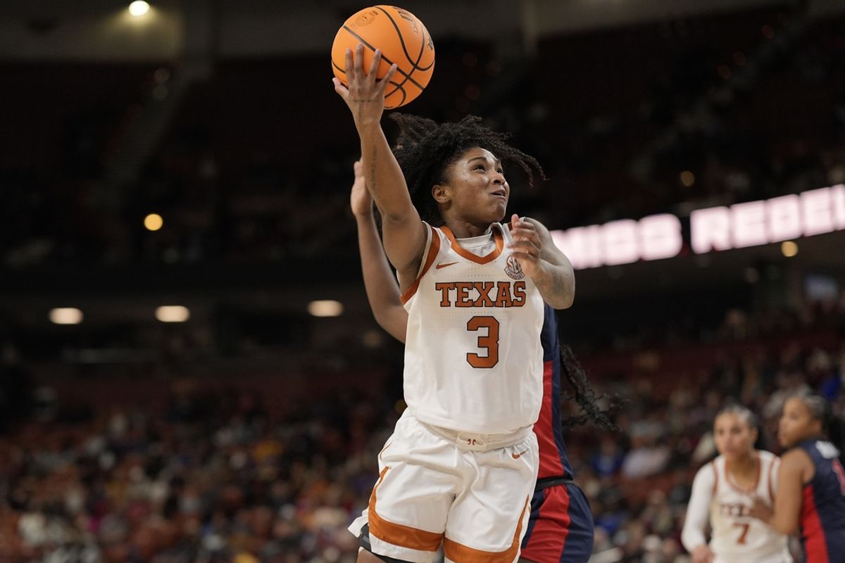 Mar 7, 2025; Greenville, SC, USA; Texas Longhorns guard Rori Harmon (3) makes a shot against the Ole Miss Rebels during the second half at Bon Secours Wellness Arena. Mandatory Credit: Jim Dedmon-Imagn Images