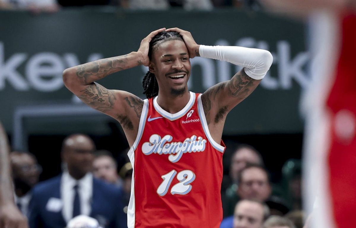 Mar 7, 2025; Dallas, Texas, USA;  Memphis Grizzlies guard Ja Morant (12) reacts against the Dallas Mavericks during the second half at American Airlines Center. Mandatory Credit: Kevin Jairaj-Imagn Images