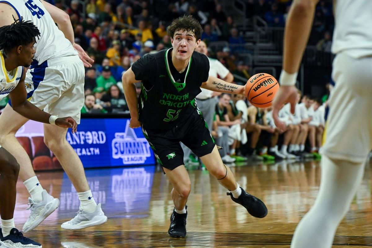 North Dakota Fighting Hawks guard Treysen Eaglestaff (52) moves the ball on Friday, March 7, 2025, at Denny Sanford Premier Center in Sioux Falls, S.D.