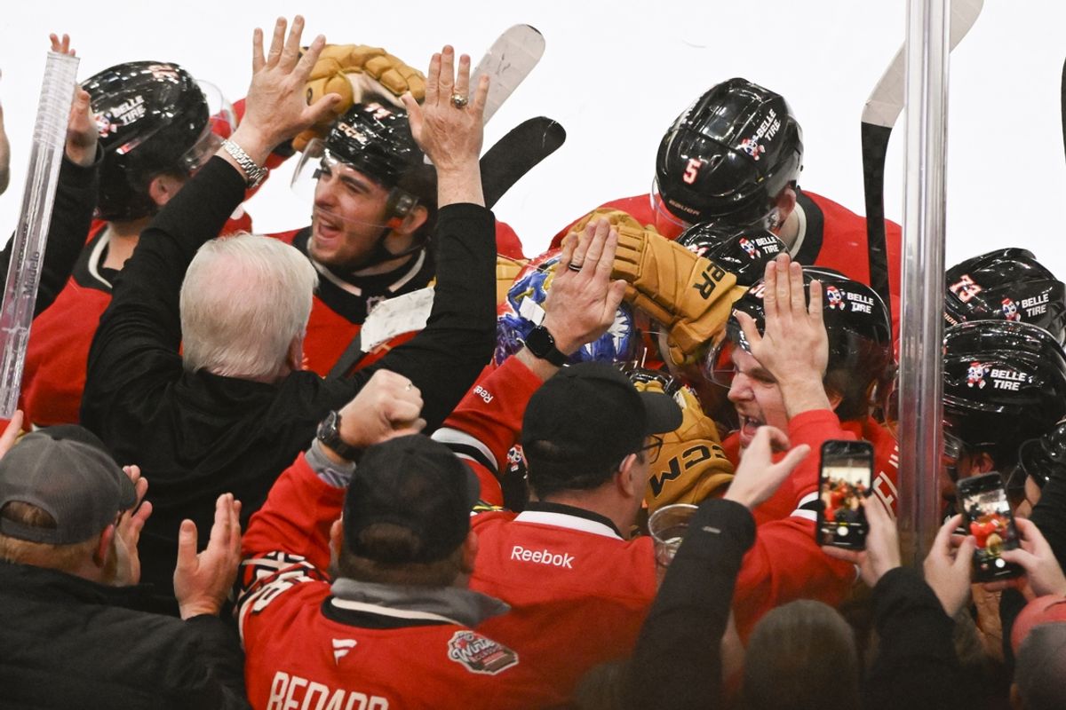 Mar 7, 2025; Chicago, Illinois, USA;   Chicago Blackhawks center Connor Bedard (98) celebrates with  teammates  after scoring the winning goal during the overtime period  at the United Center. Mandatory Credit: Matt Marton-Imagn Images