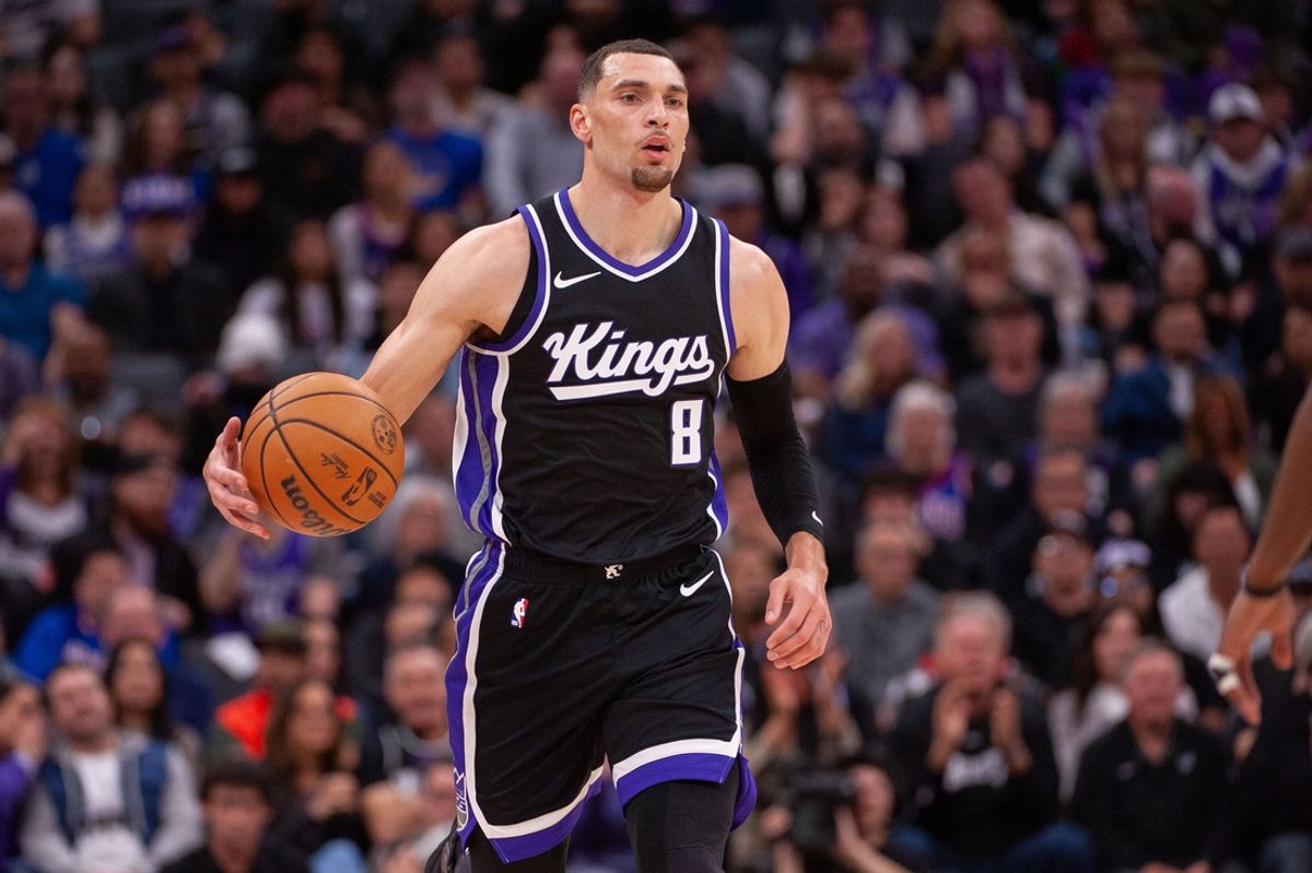 Mar 7, 2025; Sacramento, California, USA; Sacramento Kings guard Zach LaVine (8) dribbles the ball up the court during the second quarter of the game against the San Antonio Spurs at Golden 1 Center. Mandatory Credit: Ed Szczepanski-Imagn Images