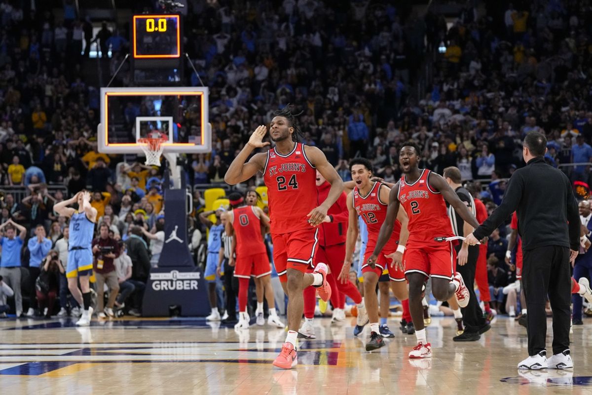 Mar 8, 2025; Milwaukee, Wisconsin, USA;  St. John’s Red Storm forward Zuby Ejiofor (24) celebrates after making the game winning shot in overtime against the Marquette Golden Eagles at Fiserv Forum. Mandatory Credit: Jeff Hanisch-Imagn Images