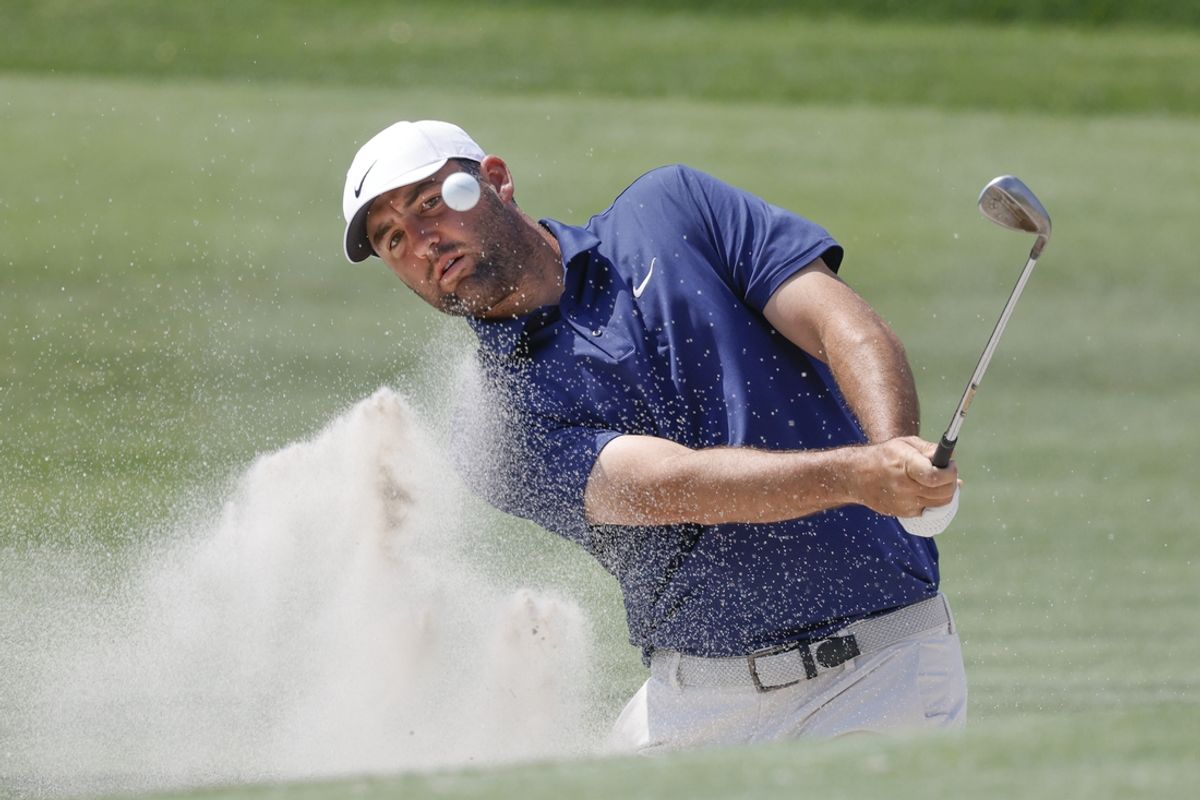 Mar 8, 2025; Orlando, Florida, USA;  Scottie Scheffler plays a shot from a bunker on the second hole during the third round of the Arnold Palmer Invitational golf tournament at Bay Hill. Mandatory Credit: Reinhold Matay-Imagn Images