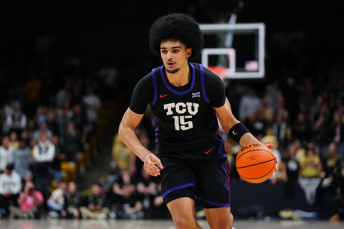 Mar 8, 2025; Boulder, Colorado, USA; TCU Horned Frogs forward David Punch (15) controls the ball in the first half against the Colorado Buffaloes at the CU Events Center. Mandatory Credit: Ron Chenoy-Imagn Images